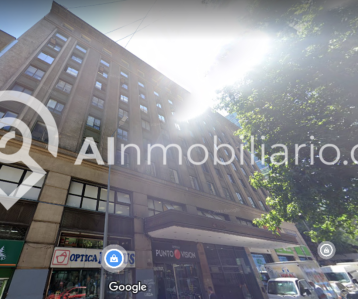 Fachada de afuera edificio ubicado en Moneda para arriendo de oficinas