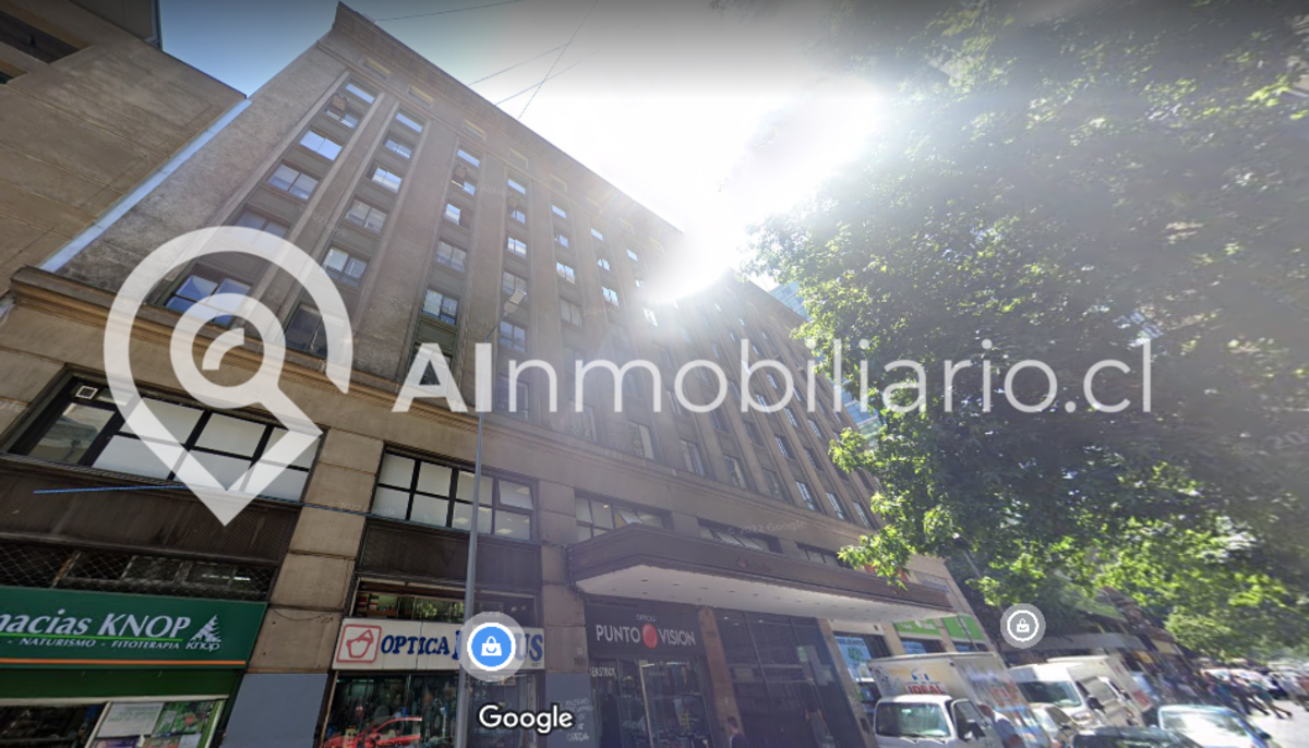 Fachada de afuera edificio ubicado en Moneda para arriendo de oficinas