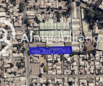 Imagen aérea que muestra una vista panorámica del terreno en venta en Nueva Central, Conchali con un terreno plano y listo para construir la casa de tus sueños