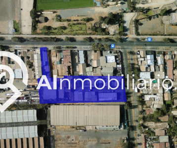 Imagen de la superficie del terreno en venta en El Parrón, La Cisterna. Conectado con importantes vías y cercano a servicios y comercios.